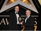 Head of Audi UK Fleet James Douglas (left) collects Audi’s second award from Elliot Scott, fleet director of Thrifty Car & Van Rental