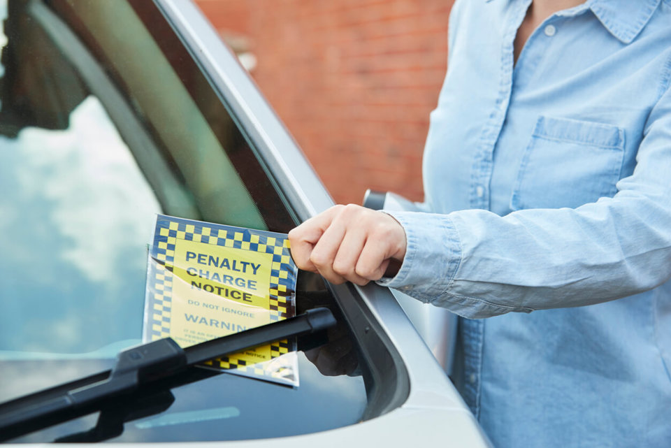 parking ticket on car