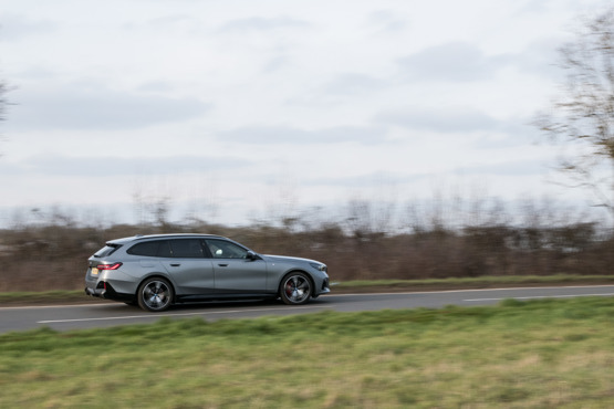 BMW i5 Touring driving