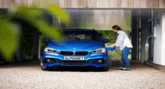 BMW charging in a garage