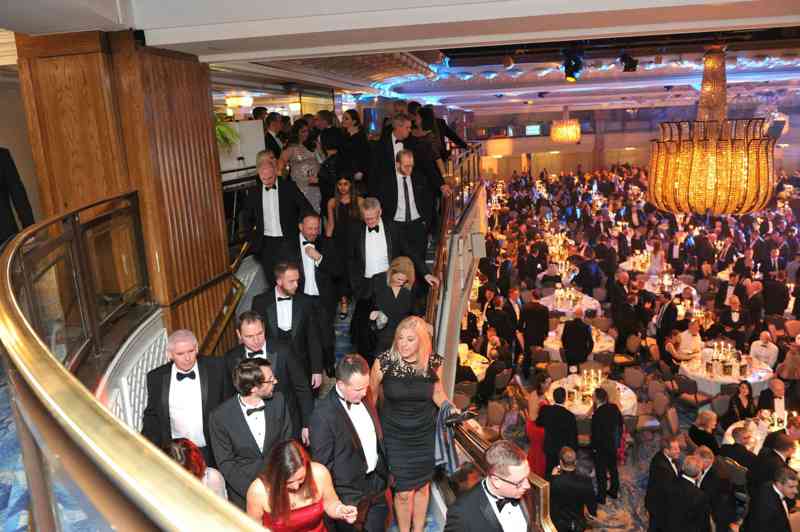 Fleet News Awards 2022 guests coming down the main stairs
