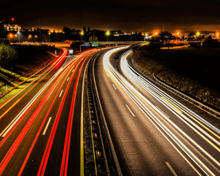 night-lights-on-road-istock-1301649008-eric-kolly-flipped