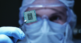 Scientist holding a semiconductor