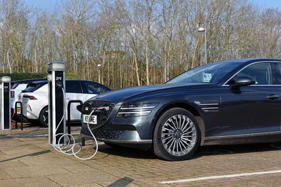 Genesis G80 plugged into charger