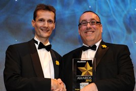 Mark Cartwright (right) receives his Fleet News award