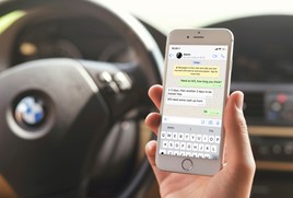 Mobile phone showing WhatsApp conversation 