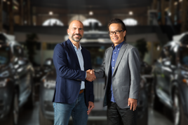 Dara Khosrowshahi, Uber's CEO, and Shigeki Tomoyama, executive vice president at Toyota, and president, Toyota Connected Company.   