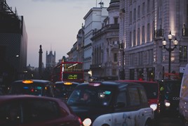 Busy, congested London street at dusk