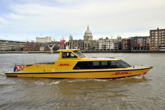 DHL Express riverboat on River Thames, London