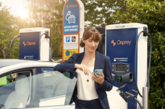 Woman using Osprey charge point