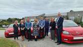 Falmouth and Penryn primary care network staff with Skoda Citigo-e vehicles