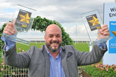 Ford of Britain fleet  director Neil Wilson displays the two awards
