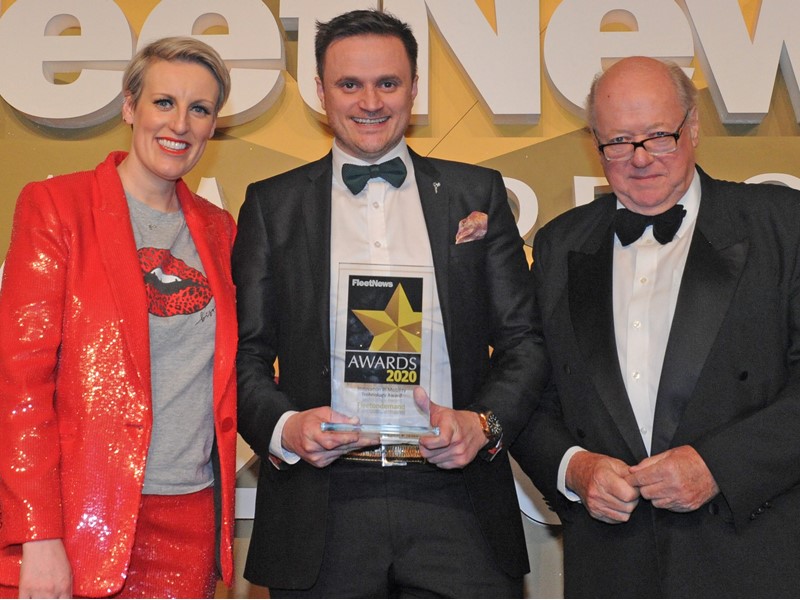 Matt Heald (centre), operations director, Fleetondemand picked up the award from Christopher Macgowan OBE, chairman of the judging panel, watched by event host Steph McGovern