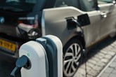 Charge point plugged into electric car