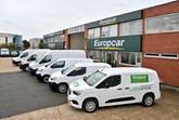Europcar vehicles parked outside Europcar office