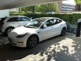Tesla parked in charging bay at Esri UK offices