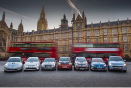 Line-up of electric vehicles outside the Houses of Parliament