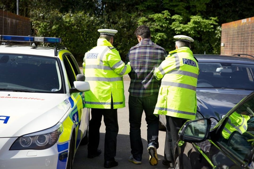 Police arresting a man