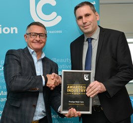 Nick Hutton, Prestige operations director (right) receives the award from David Simms, managing director of Leicester Mercury