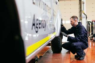 Rivus technician with Environment Agency vehicle