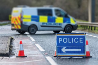 Police road sign accident