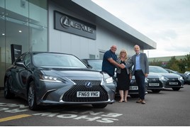 Kelvin Tompkins, managing director of Topps, receives the Lexus ES models from Collette Harris, Toyota and Lexus Fleet Services, and Steve Holler, corporate sales Lexus Leicester