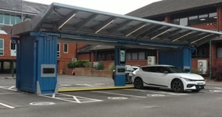 Pop-up solar-powered electric vehicle charging hub, 3ti 