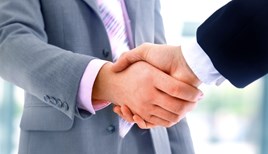 handshake between two executives