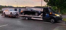 Reliable Vehicle Logistics transporter with two cars onboard