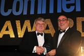 Mark Cartwright, head of vans, FTA (right) presents the lifetime contribution award to Eddie Cross