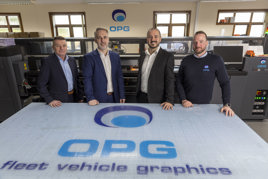Members of the senior management team with OPG graphic