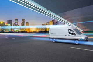 Refrigerated van passes under flyover