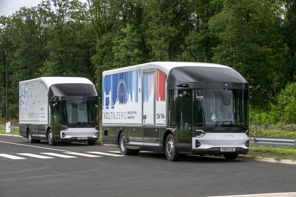 Two Volta Zero electric trucks on the road